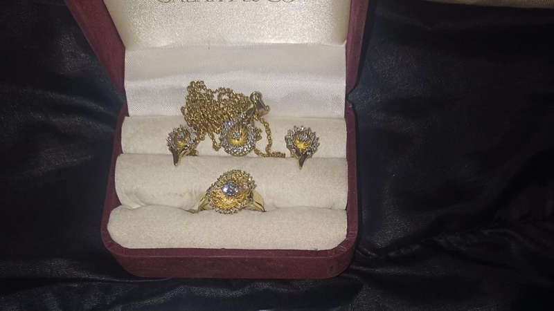 18 carat Angel diamond ring with 9 carat diamond earrings and pendant  rare to find as a set.