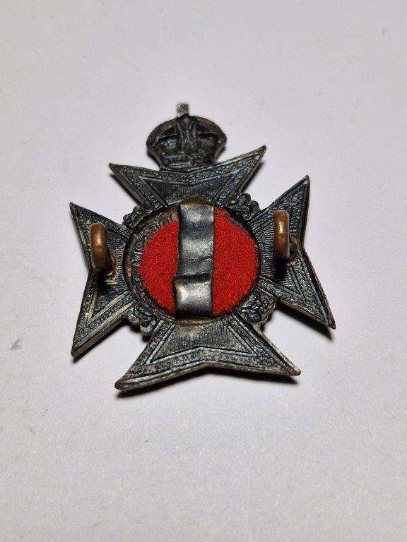 Royal Rhodesia Regiment cap badge. King's crown