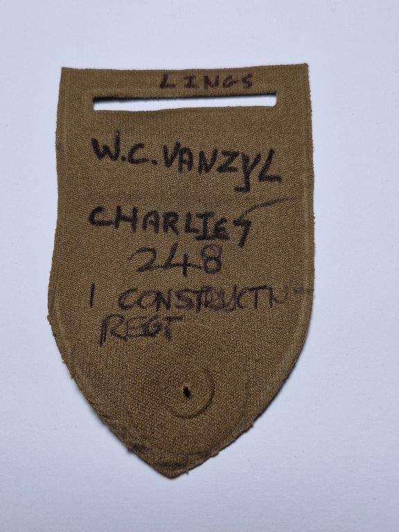 SADF 1 Construction Regiment tupperware shoulder flash. Pin intact