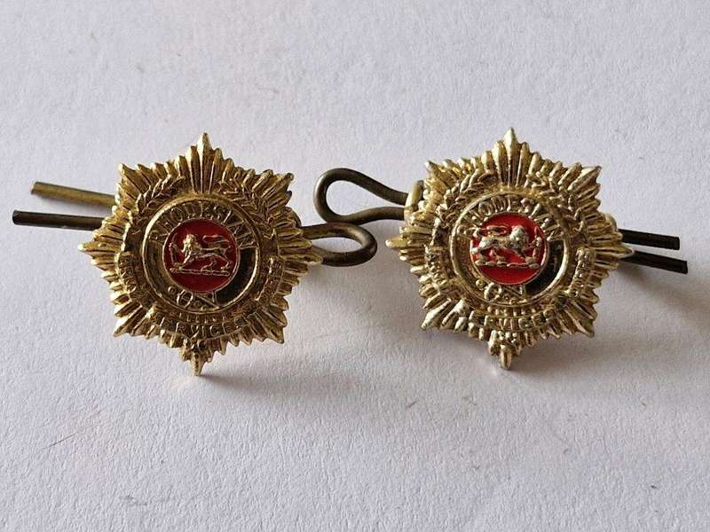 Rhodesian Army Service Corps collar badges. One lug broken.