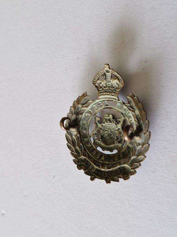 WWII South African Engineers cap badge domed type.
