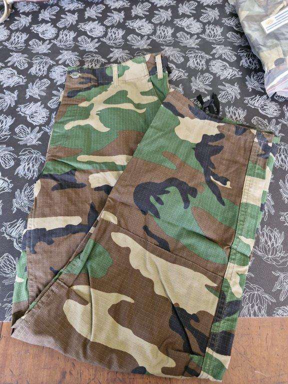 US Woodland Camo Combat Trousers. 46 Cm across waist.