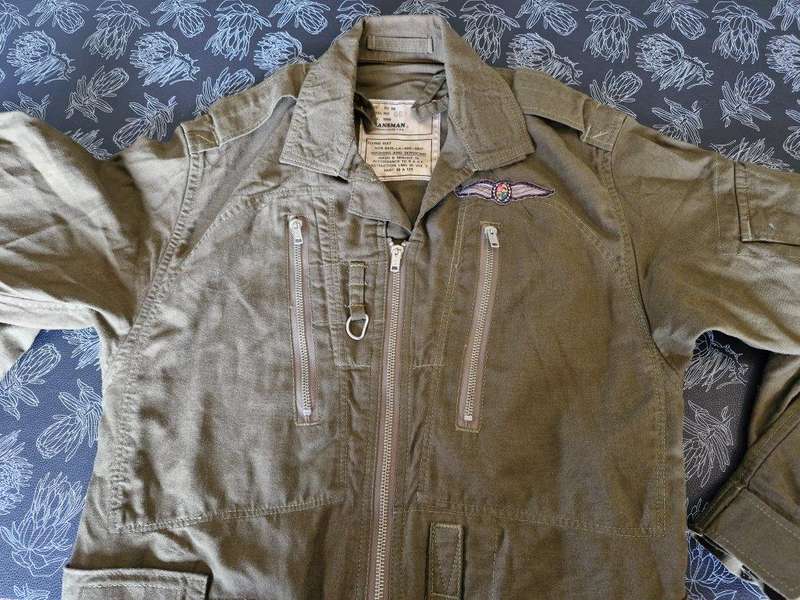 SAAF Flight Suit with survival knife. 46 Cm Armpit to Armpit. Scales one side of knife broken.
