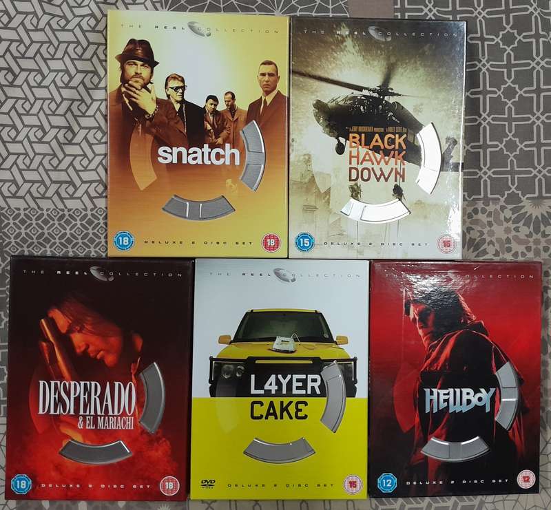 5 movie bundle (2 dvd sets, each with cards in movie reel tins)