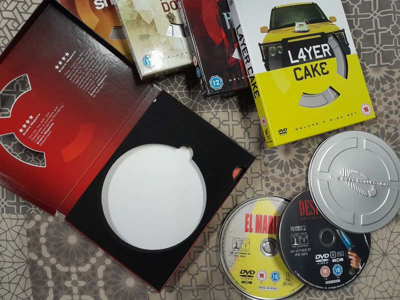 5 movie bundle (2 dvd sets, each with cards in movie reel tins)