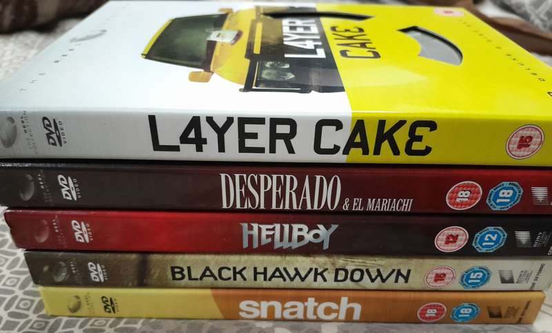 5 movie bundle (2 dvd sets, each with cards in movie reel tins)