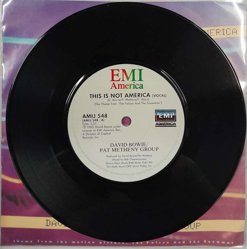 David Bowie / Pat Metheny Group - This Is Not America 7" single (theme The Falcon and the Snowman)