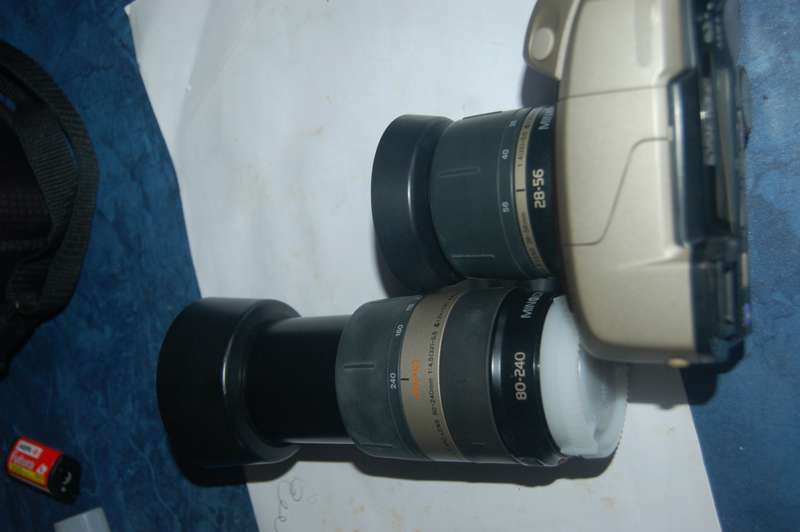 MINOLTA AUTO 115MM WIDE ANGLE FILM CAMERA HAS TWO ZOOM LENSES 28-56MM AND 80-240MM