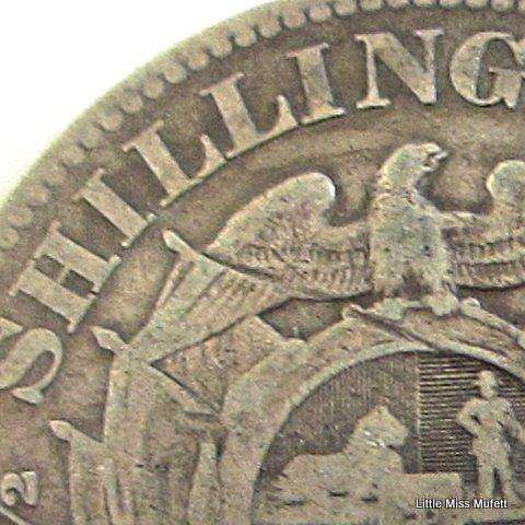 An 1895  ZAR Kruger 2 1/2 Shilling. ,925 silver