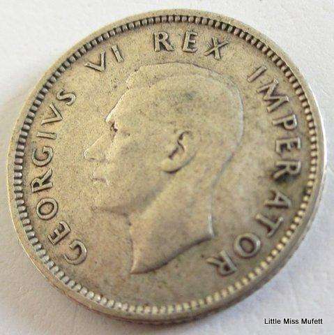 A 1938 South African 6d----CompositionSilver (.800) Weight 2.8gram