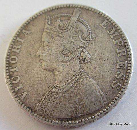An 1891 India one rupee Victoria ,917 silver 11 ,66 gram