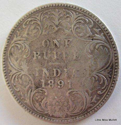 An 1891 India one rupee Victoria ,917 silver 11 ,66 gram