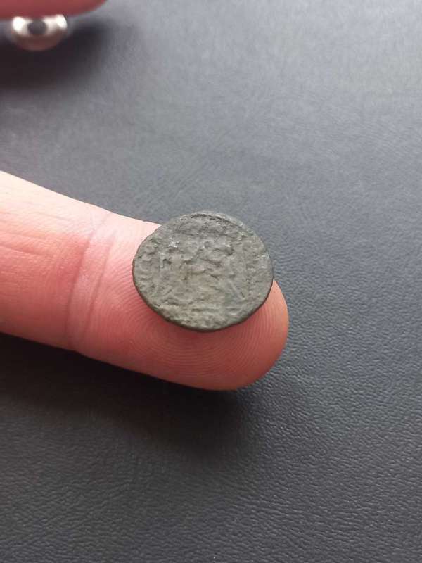 Ancient coin, some detail, uncleaned