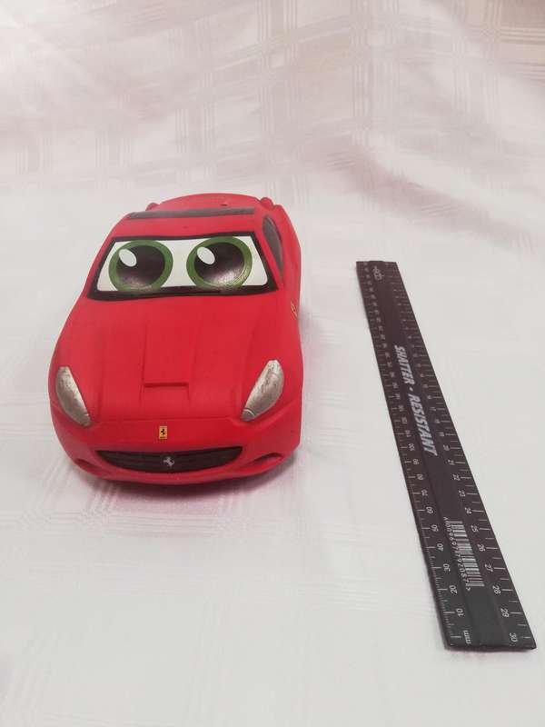 Ferrari rubber top battery operated car. Untested