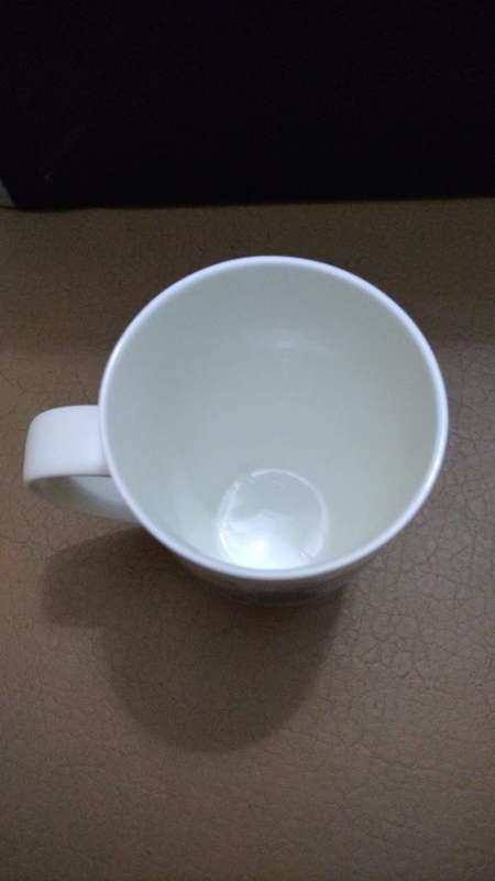 Carrol Boyes collectable 'Look back' mug 400ml