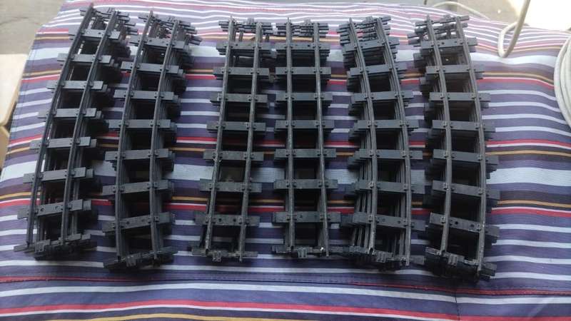 Lot of strong, metal train tracks. Inside track is 32mm(3.2cm). Outside track: 36mm(3.6cm).