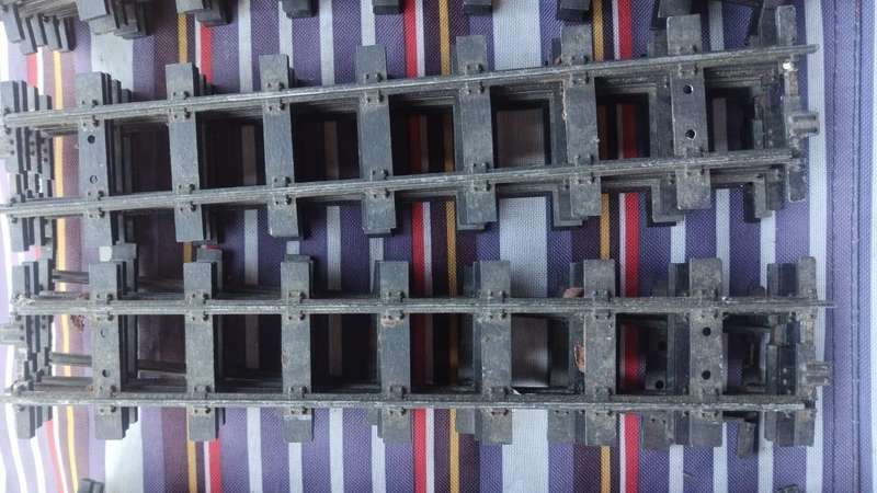 Lot of strong, metal train tracks. Inside track is 32mm(3.2cm). Outside track: 36mm(3.6cm).