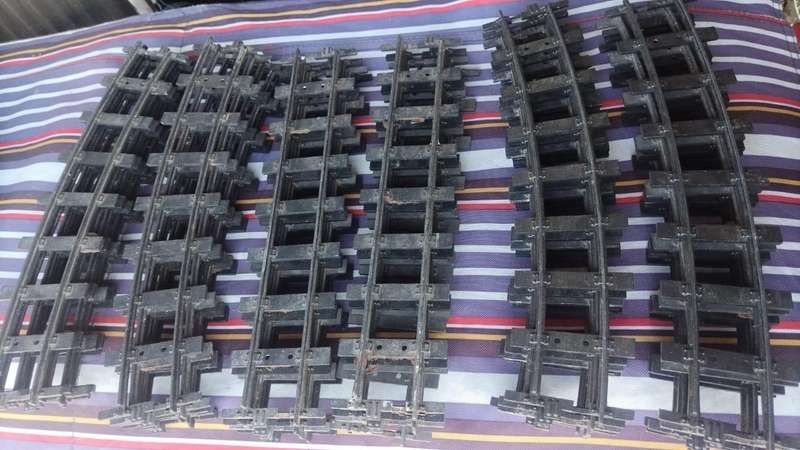 Lot of strong, metal train tracks. Inside track is 32mm(3.2cm). Outside track: 36mm(3.6cm).