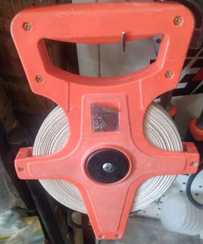 50 metre rollable measuring tape with metre and feet measurements
