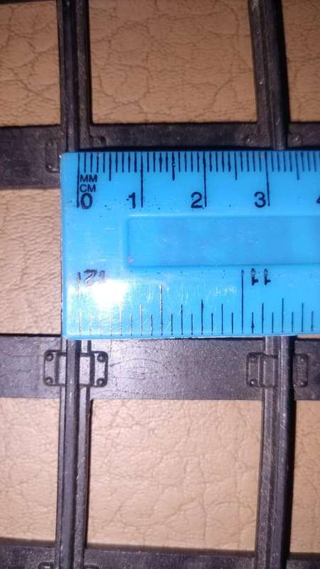 Lot of strong, metal train tracks. Inside track is 32mm(3.2cm). Outside track: 36mm(3.6cm).