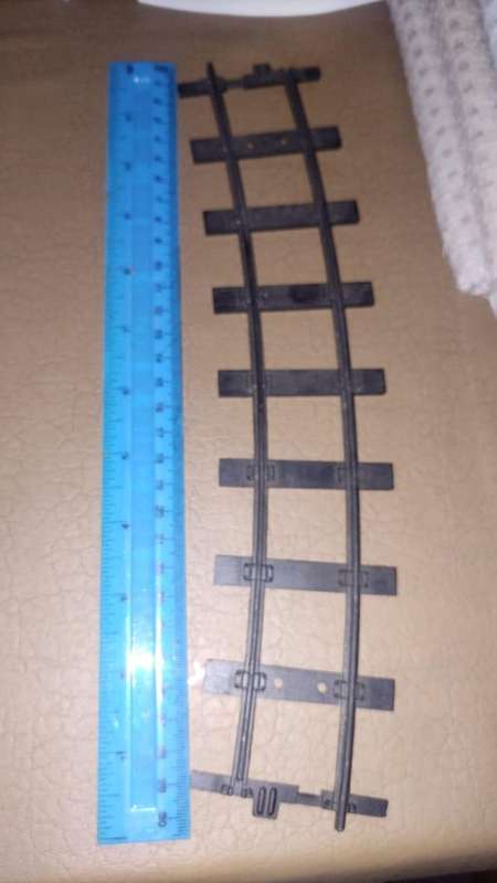 Lot of strong, metal train tracks. Inside track is 32mm(3.2cm). Outside track: 36mm(3.6cm).