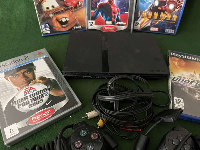 Playstation 2 Console with 5 games, 2 controllers, 8GB memory card