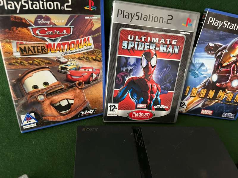 Playstation 2 Console with 5 games, 2 controllers, 8GB memory card
