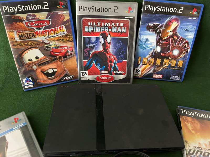Playstation 2 Console with 5 games, 2 controllers, 8GB memory card
