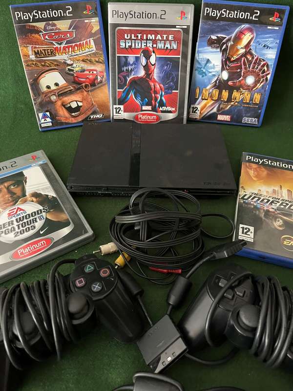 Playstation 2 Console with 5 games, 2 controllers, 8GB memory card