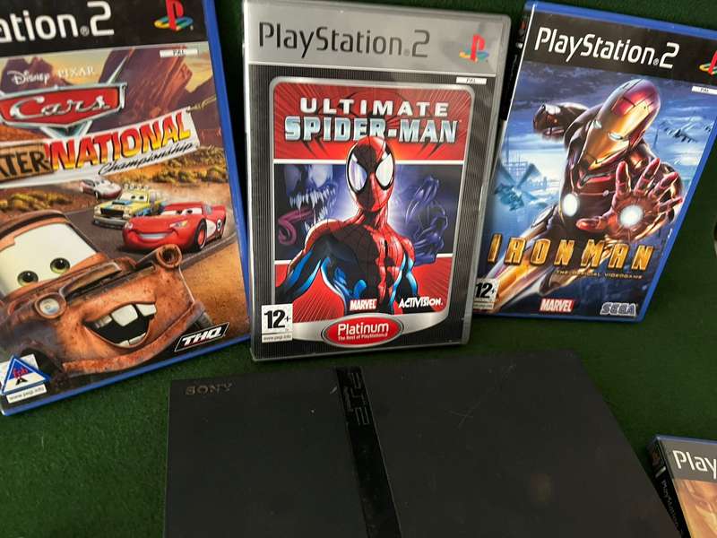 Playstation 2 Console with 5 games, 2 controllers, 8GB memory card