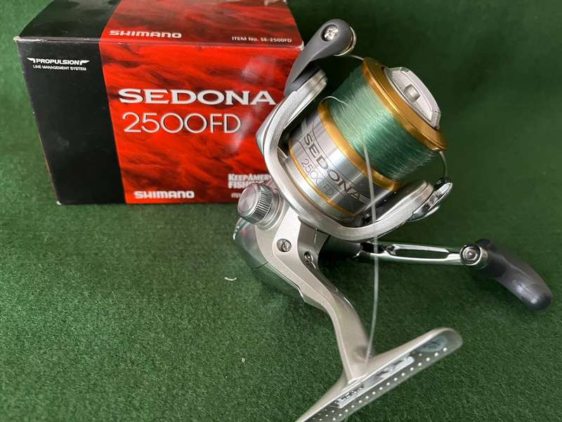Bass reel : Shimano Sedona 2500FD - with backing and braid line - never been used