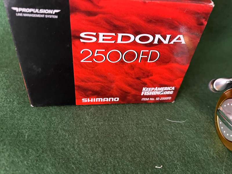 Bass reel : Shimano Sedona 2500FD - with backing and braid line - never been used