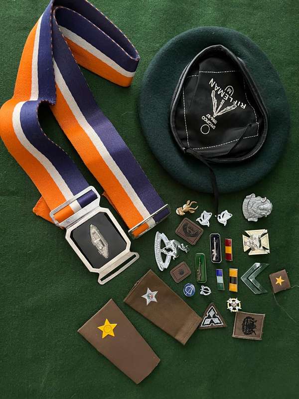 Job lot of SADF stable belt, beret, badges, rank etc