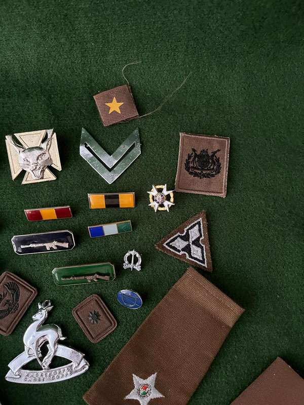 Job lot of SADF stable belt, beret, badges, rank etc