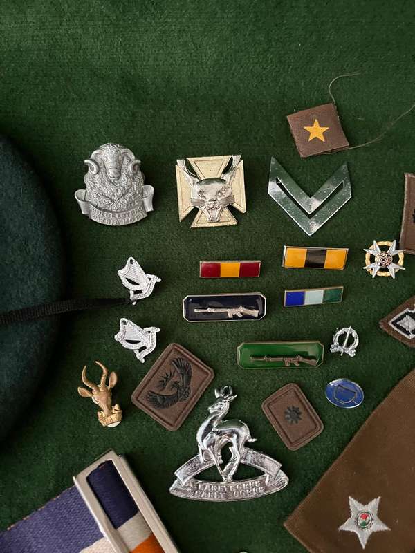 Job lot of SADF stable belt, beret, badges, rank etc