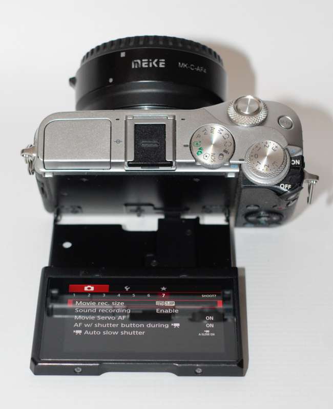 Canon EOS M6 24.2MP WITH Meike MK-C-AF4 EF to M Autofocus Adapter , CHARGER