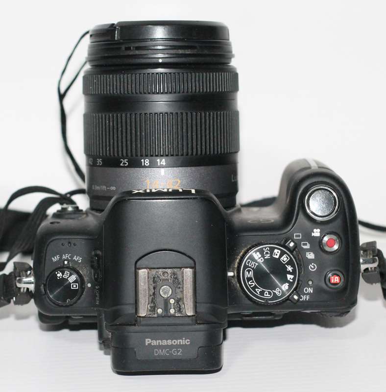 Panasonic Lumix DMC-G2 12.1 MP Live MOS Mirrorless Camera Touch Screen LCD and 14-42mm Lumix G Lens