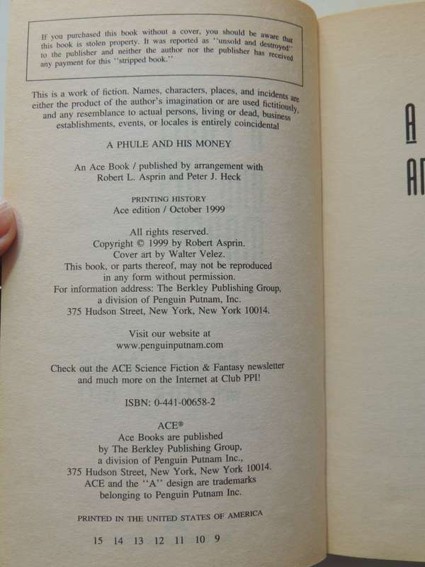 A Phule and his Money - Robert Asprin with Peter  J Heck