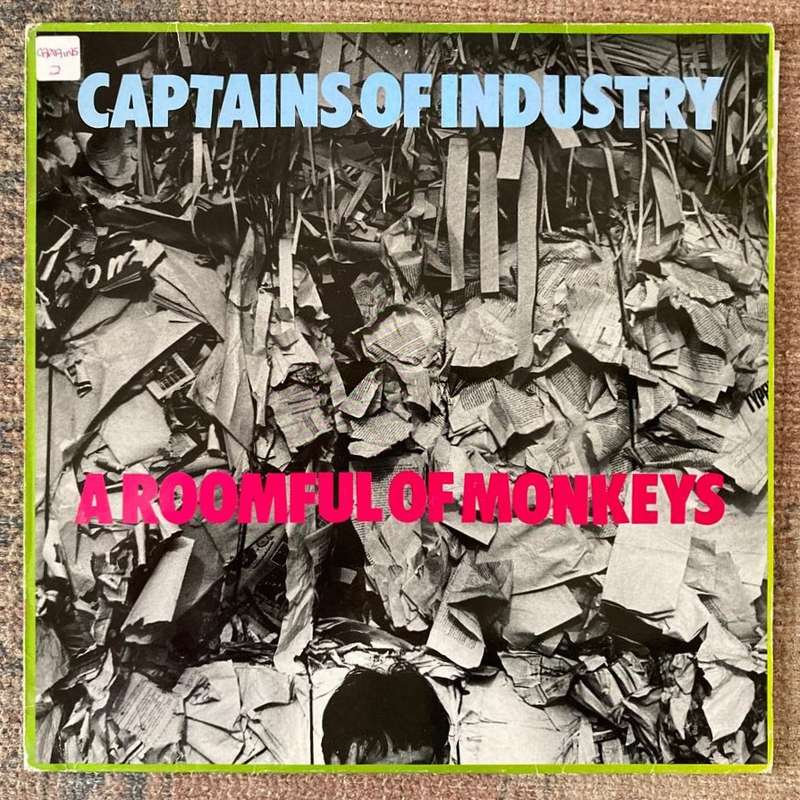 Captains Of Industry - A Roomful of Monkeys LP/Album (1985 UK import) VG+/VG+