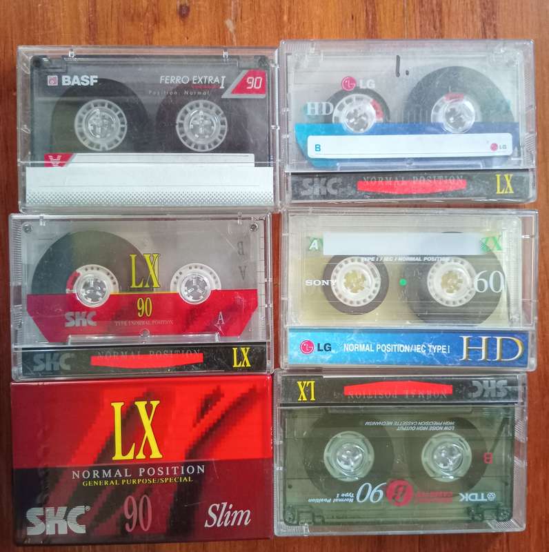Lot of 5 Used and 1 New and Sealed Cassettes