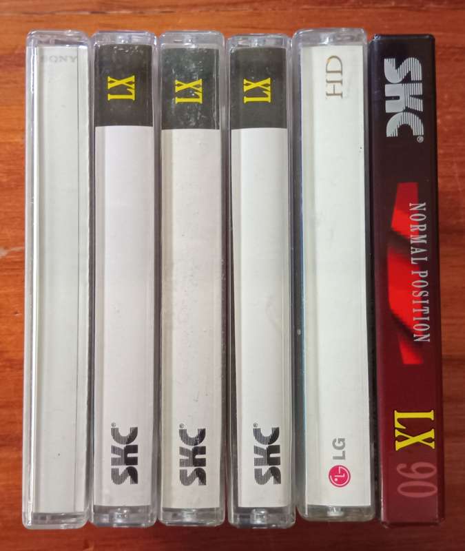 Lot of 5 Used and 1 New and Sealed Cassettes