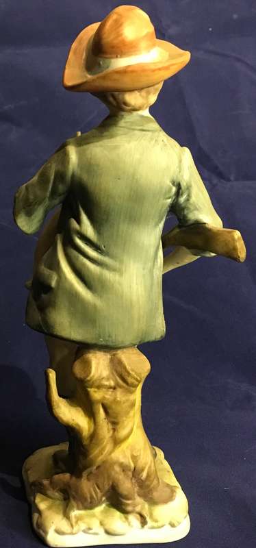 Vintage boy with rabbit figurine
