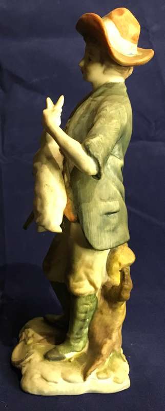 Vintage boy with rabbit figurine