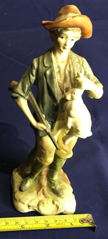 Vintage boy with rabbit figurine
