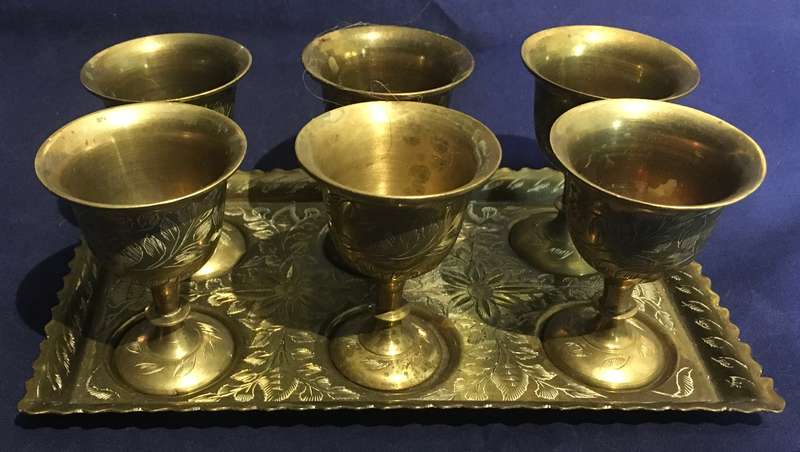 Brass egg cups (6) on a tray. Vintage