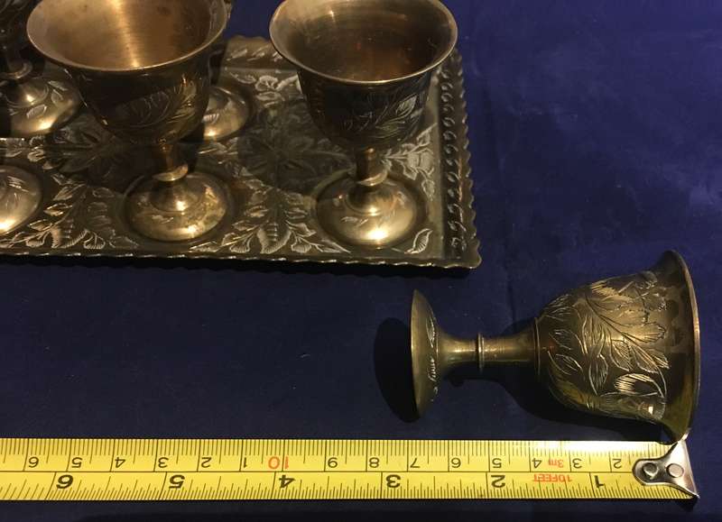 Brass egg cups (6) on a tray. Vintage