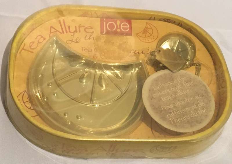 Tea charm and caddy by Jole