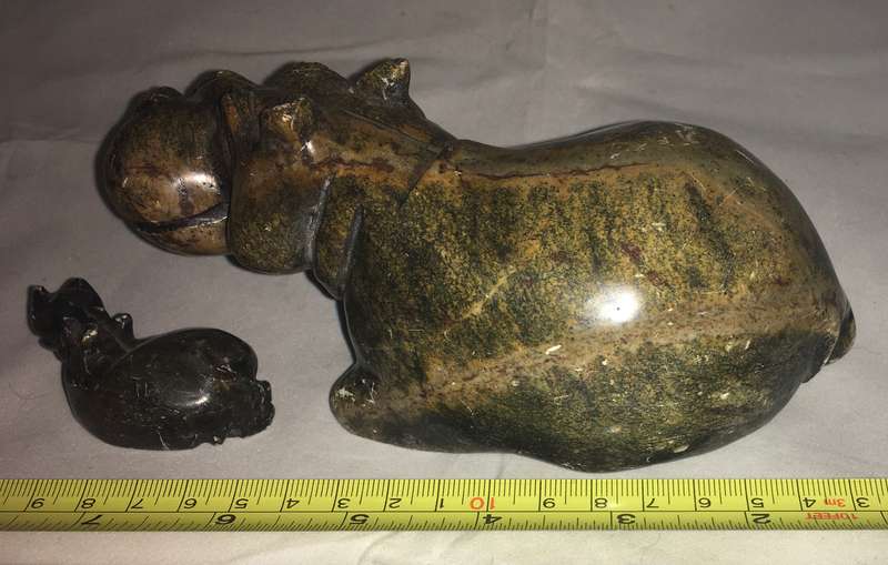 Marble mother and baby hippopotamus