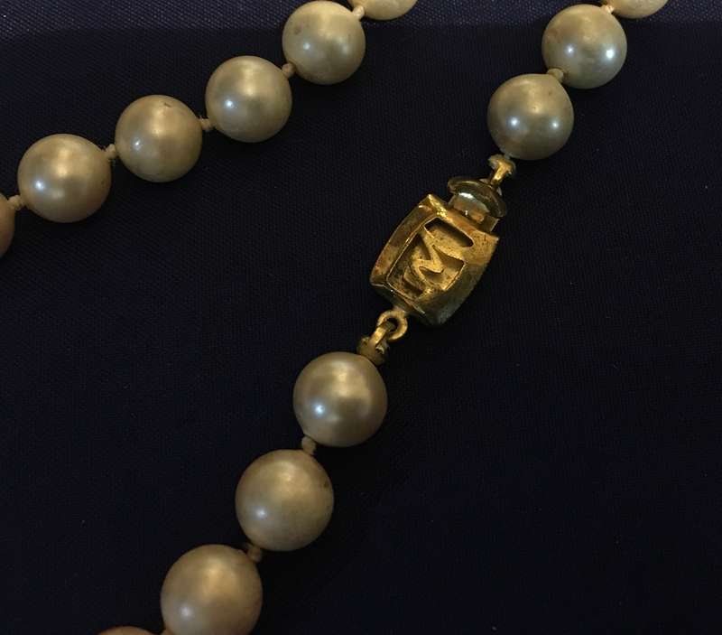 Faux single strand pearls