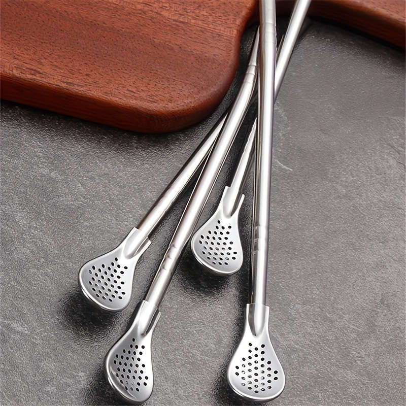 A Set Of Three Stainless Steel Straw Spoon